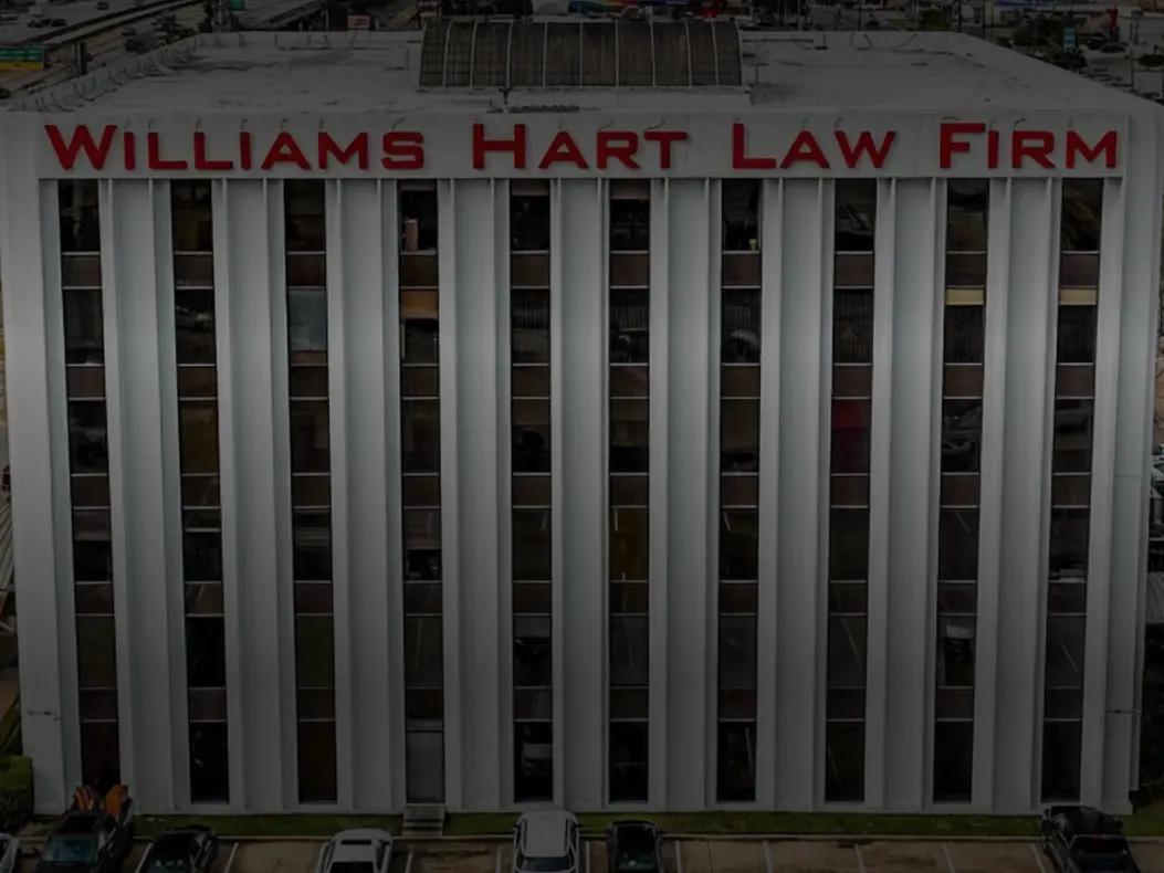 The firm's office building, with its name across the top floor.
